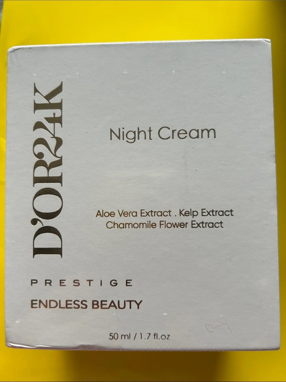 D'Or Skincare moisturizer set in cream, white and yellow packaging